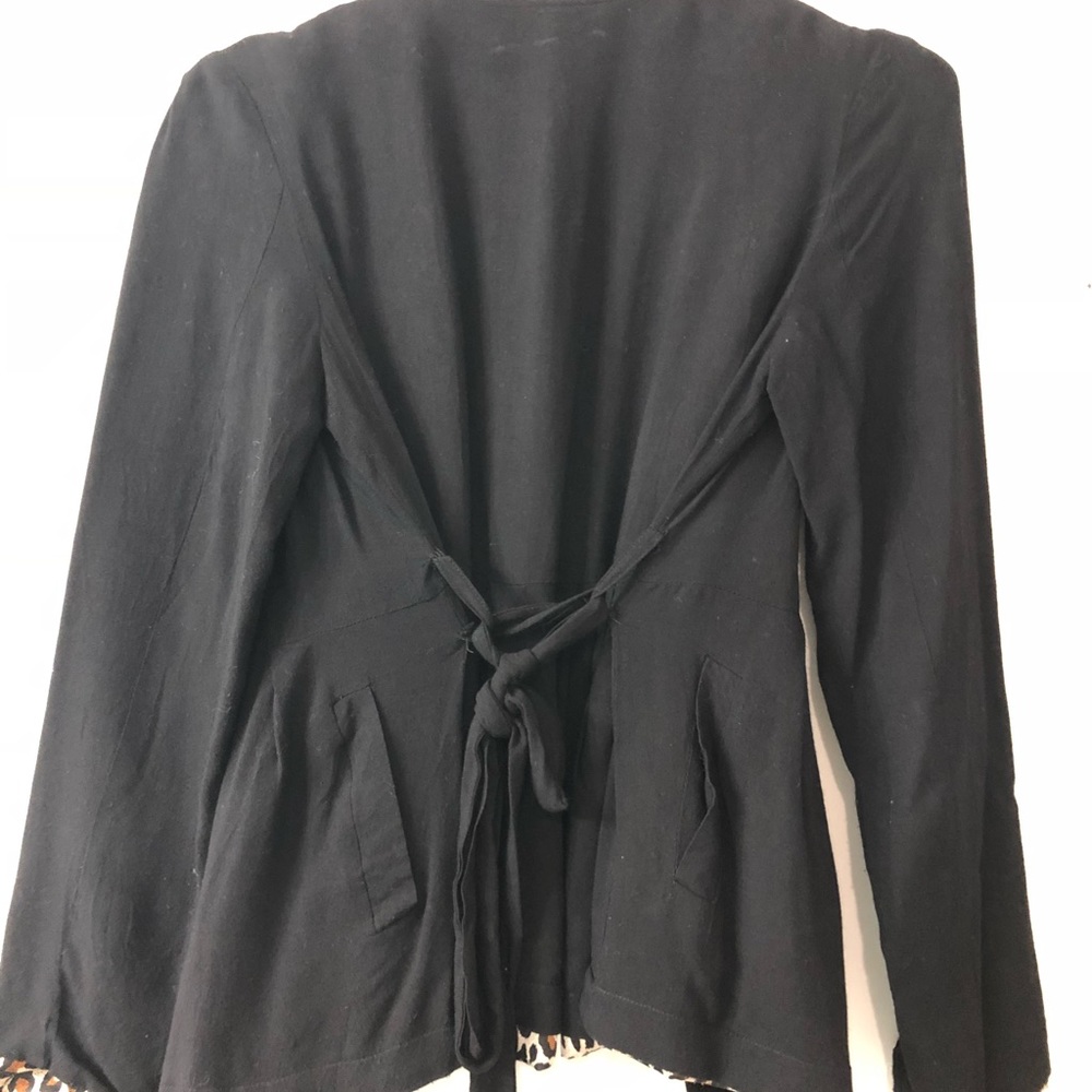 Black blazer with leopard print inside